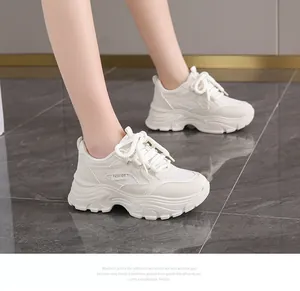 Detail of women's chunky sneakers with breathable mesh and thick platform sole