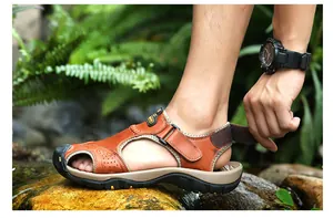 Close-up of adjustable strap on men's breathable outdoor closed-toe sandals