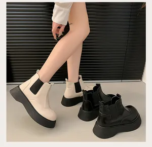 Stylish thick-soled women's Chelsea boots in beige and black faux leather style