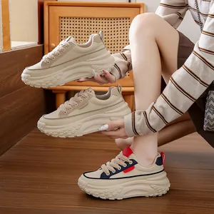 Stylish women's beige chunky platform sneakers with retro design for casual wear