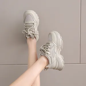 Women's stylish beige chunky platform sneakers featuring a breathable mesh design