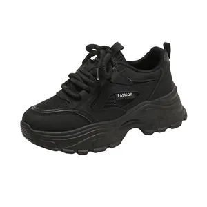 All-black women's chunky dad sneakers with thick platforms for casual sports