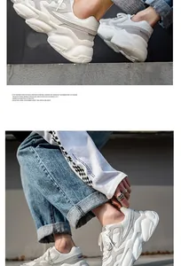 Detail view of men's breathable mesh chunky sneakers in retro white and grey