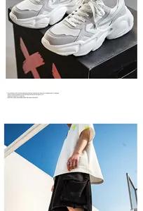 Detailed close-up of grey and white mesh breathable chunky sneakers for urban lifestyle