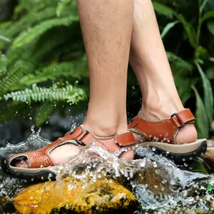 Breathable men's outdoor closed-toe sandals with thick non-slip soles for beach use.