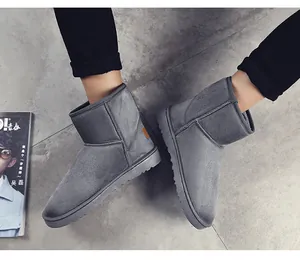 Detailed top-down view of grey suede winter snow boots for men featuring thick non-slip soles