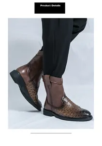 Detailed macro shot of vintage brown men's tall cowboy boots with ostrich pattern.