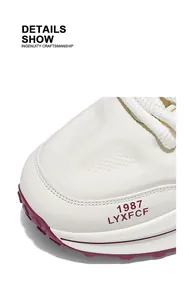 Close-up detail of white chunky sneaker toe with purple sole and rope laces