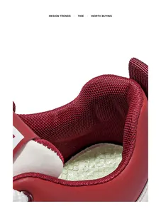 Macro view showing the breathable mesh lining and cushioned insole of the red sneaker