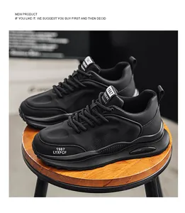 Detailed side profile of stylish black chunky dad sneakers on a wooden display stool