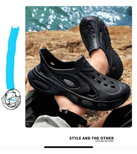 Detail shot of durable black breathable men's clogs for beach and outdoor wear.
