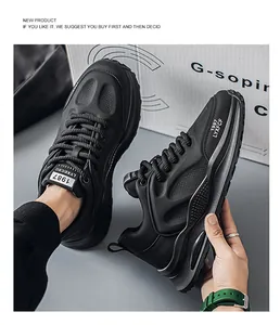 Detailed view of black chunky sneakers with thick soles and retro design