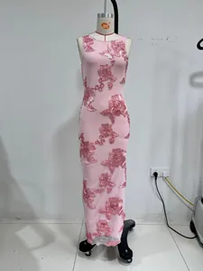 Detailed view of pink evening gown featuring 3D floral embroidery and bodycon silhouette