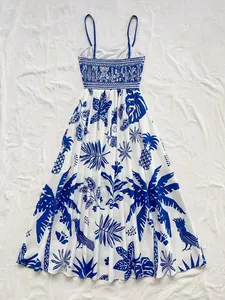 Blue and white tropical print maxi dress flat lay with spaghetti straps