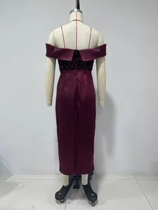Back view of a burgundy satin off-the-shoulder dress with sequined bodice on mannequin