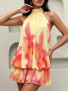 Robe courte élégante dos nu à fleurs jaunes avec jupe bouffante pour les vacances