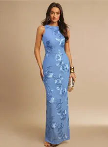 Detailed view of elegant light blue evening dress with 3D floral embroidery applique
