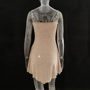 Back view of a sparkling rhinestone sheer spaghetti strap mini party dress in nude
