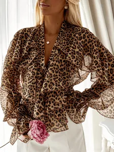 Detail of leopard print chiffon blouse featuring layered ruffles and flared sleeves.