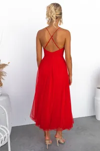 Detailed back view of a sexy red cross-back camisole midi dress with a flowing tulle skirt