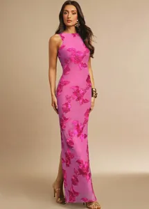 Macro view of detailed 3D floral embroidery on pink sleeveless bodycon evening maxi dress