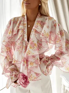 Elegant floral print chiffon blouse featuring layered ruffles and flared sleeves design