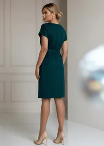 Elegant back view of a minimalist dark green short-sleeve dress with a waist belt detail