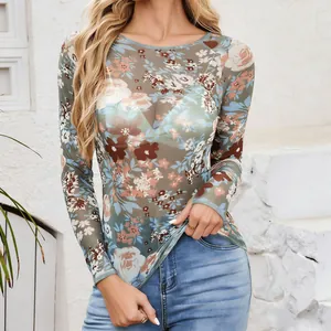 Detailed view of sheer floral mesh long sleeve top featuring vintage flower pattern