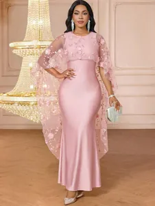 Elegant pink evening gown with floral lace cape shrug overlay for special occasions