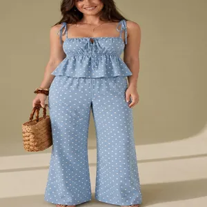 Blaues zweiteiliges Polka-Dot-Set mit Trägertop und weit geschnittener Hose für Damen.