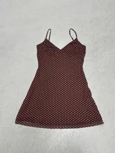 Elegant vintage brown polka dot spaghetti strap mini dress with V-neck flat lay view