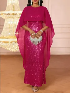 Elegant fuchsia sequined floor-length evening gown featuring a matching sheer cape shawl.