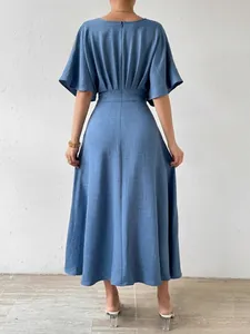 Elegant blue V-neck short sleeve waisted midi dress with a flowing A-line silhouette.