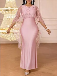 Elegant pink sleeveless maxi dress with sheer floral lace capelet for evening events