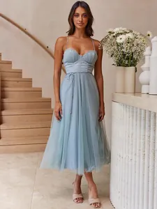 Elegant light blue midi dress with corset bodice and flowing tulle skirt for vacation