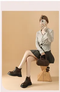 Women's British style dark brown platform Chelsea boots with front zipper detail