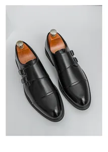 Detailansicht der schwarzen Herren-Leder-Business-Schuhe mit doppeltem Monk-Strap Design