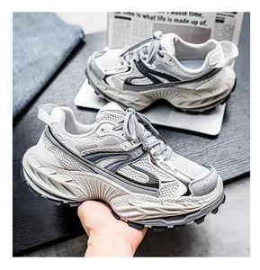 Detailed view of breathable mesh and thick sole on men's chunky dad sneakers.