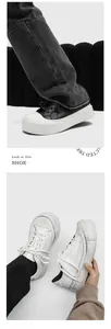 Detail view of men's chunky platform sneakers in black and white styles with thick soles.