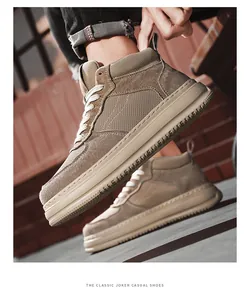 Macro detail view of men's khaki high-top breathable mesh sneakers with platform sole