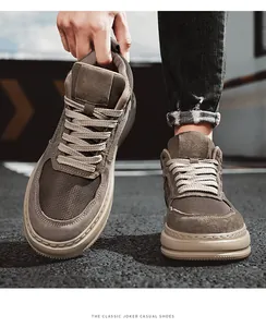 Macro view of breathable brown mesh men's casual sneakers with a durable thick sole.