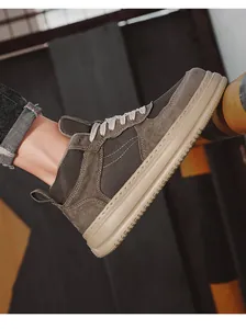 Macro view of men's brown breathable mesh sneaker featuring a stylish chunky flat sole