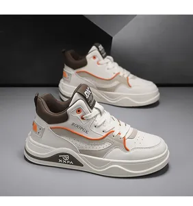 Sneaker sportive alte da uomo con suole spesse e vivaci dettagli di colore arancione