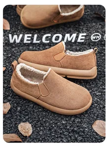 Detailed view of brown suede slip-on shoes with warm fleece lining for winter