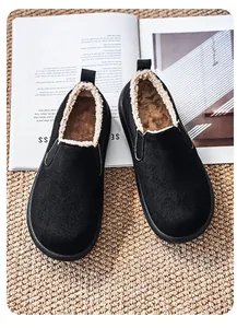 Cozy black winter slip-on shoes for men featuring thick plush lining and soft suede finish