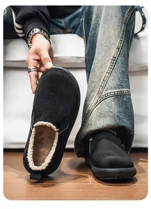 Detail view of men's winter slip-on shoe with thick beige fleece lining for warmth