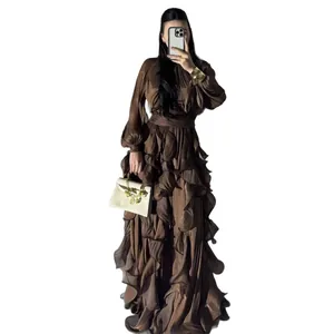 Sophisticated deep brown pleated maxi dress featuring cascading ruffled tiers and long sleeves