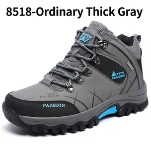 Men's high-top hiking shoes in grey with thick non-slip soles and blue accents
