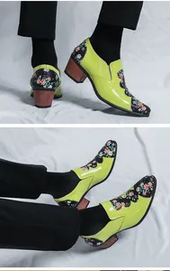 Detailed view of lime green floral patent leather pointed shoes with a block heel
