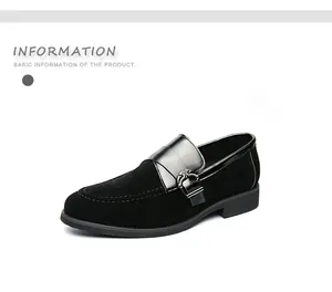 Detailed view of premium black suede men's loafer with leather strap and metal buckle detail.